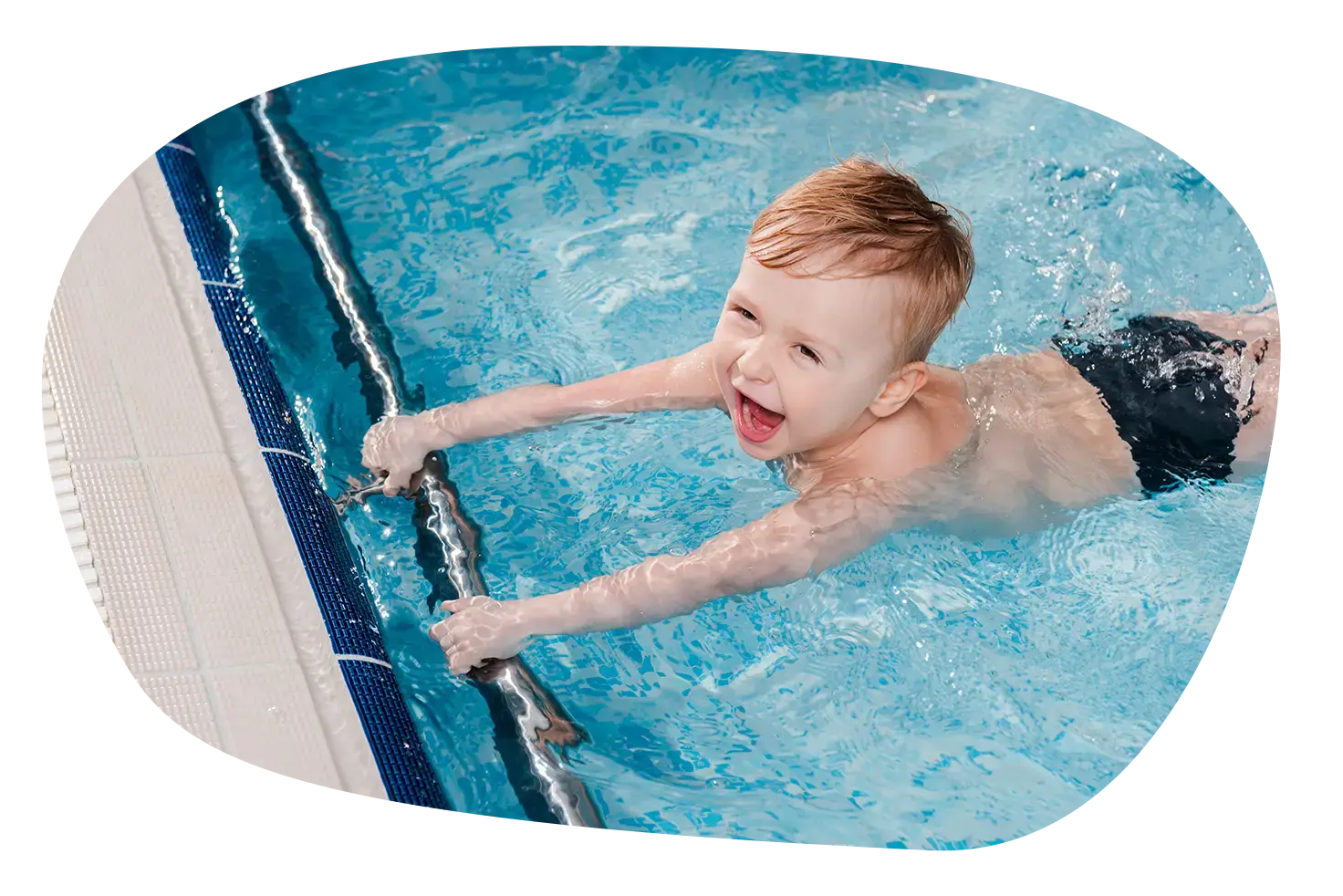 overhead view of excited toddler boy swimming near 2024 11 09 23 32 25 utc